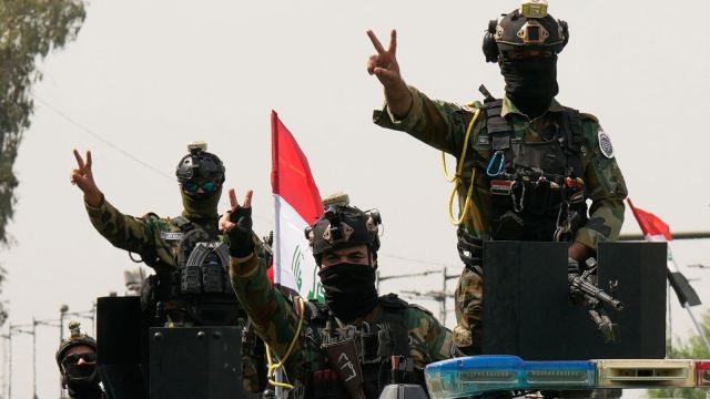 Iraq's Green Flags And Guns 